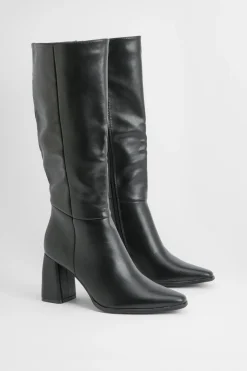 Bottes montantes jusqu'aux genoux à talon bloc et détail de couture
