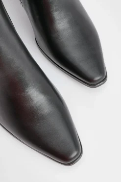 Bottes montantes jusqu'aux genoux à talon bloc et détail de couture