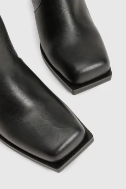 Bottes montantes à l'aspect vieilli à talons blocs