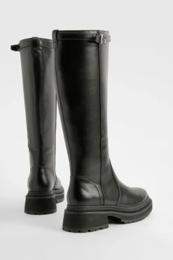 Bottes montantes massives avec détails de sangle à boucle