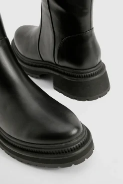 Bottes montantes massives avec détails de sangle à boucle