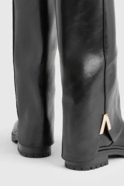 Bottes montantes rabattables avec détails de quincaillerie massifs