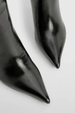 Bottes montantes stilettos à bout pointu