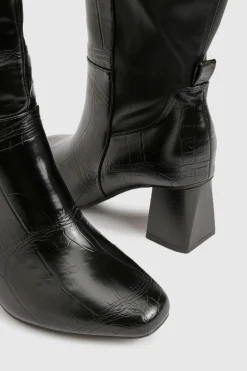 Bottes montantes stretch à coupe large, évasées et à talon bloc