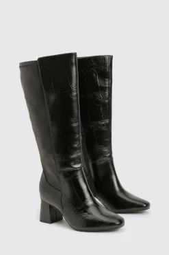 Bottes montantes stretch à coupe large, évasées et à talon bloc
