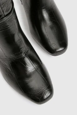Bottes montantes stretch à coupe large, évasées et à talon bloc