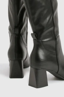 Bottes montantes stretch à talon évasé