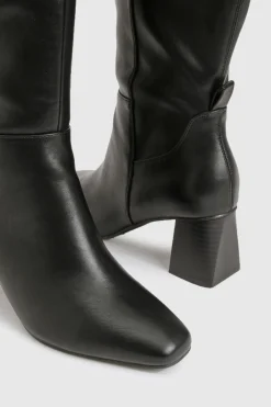 Bottes montantes stretch à talon évasé