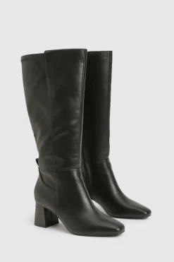 Bottes montantes stretch à talon évasé