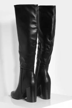 Bottes montantes à talons hauts