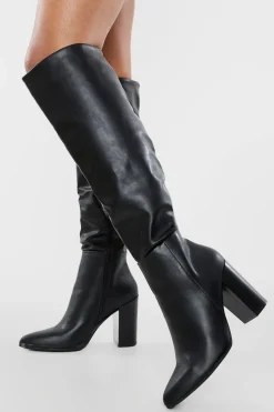 Bottes montantes à talons hauts