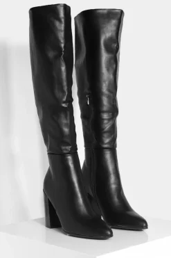 Bottes montantes à talons hauts