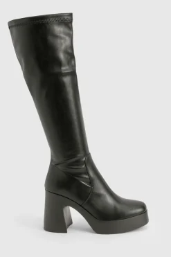 Bottes montantes à talon évasé