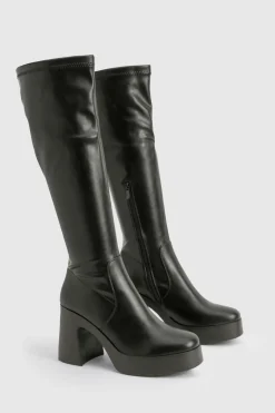 Bottes montantes à talon évasé