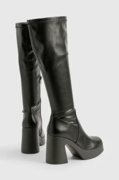 Bottes montantes à talon évasé