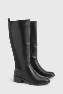 boohoo Bottes plates hautes jusqu'aux genoux, massives, avec détails de panneaux élastiques< Bottes|Bottes Hautes
