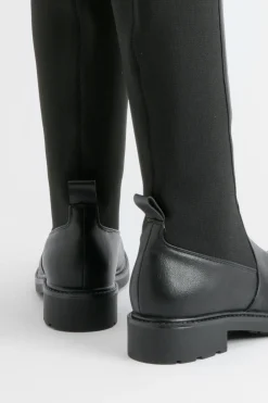Bottes plates à hauteur du genou avec panneaux élastiques