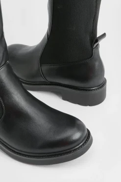 Bottes plates à hauteur du genou avec panneaux élastiques
