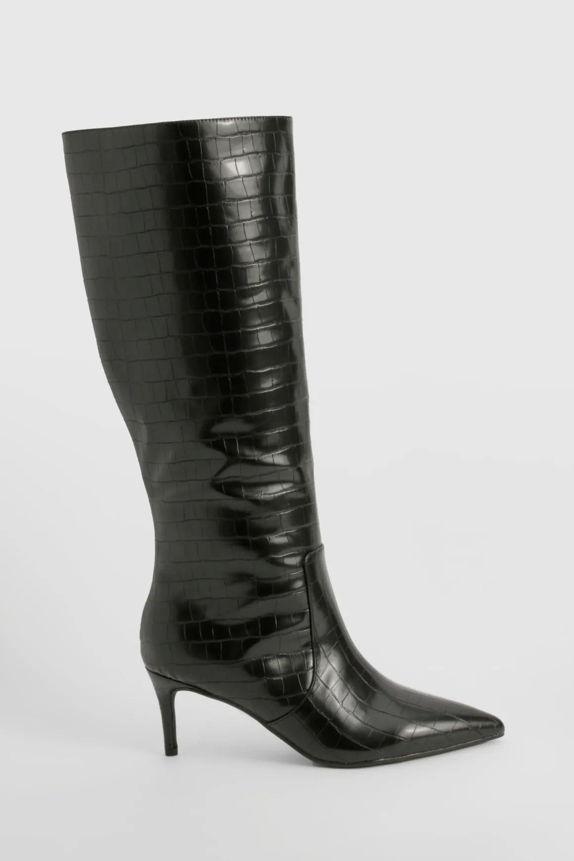 Bottes stiletto hautes jusqu'aux genoux courbées