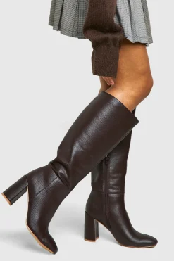 Bottes à talon texturées arrivant au genou