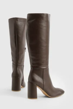 Bottes à talon texturées arrivant au genou