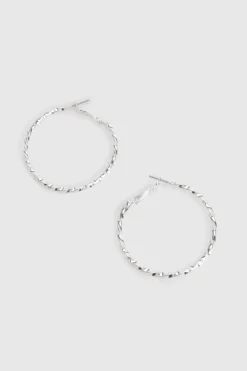 Boucles d'oreilles créoles larges ornées d'argent