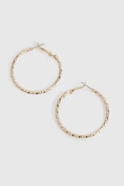 Boucles d'oreilles créoles torsadées en or