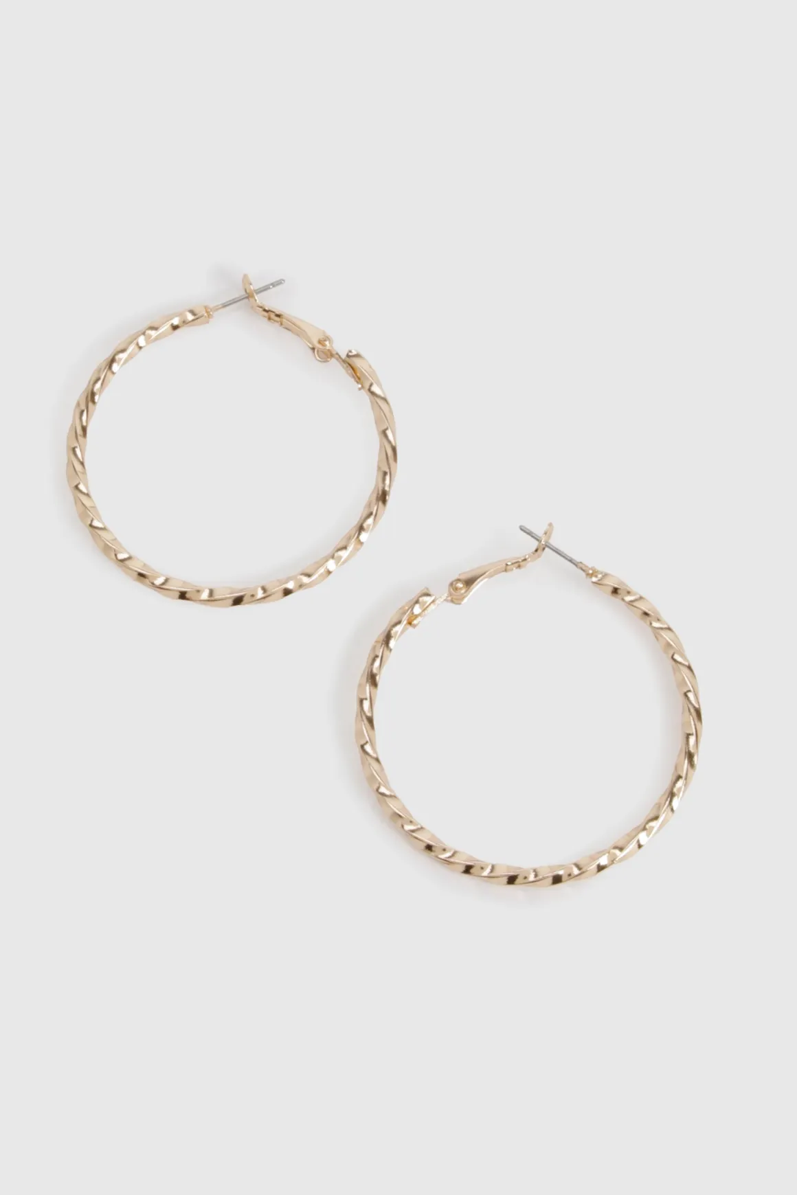 Boucles d'oreilles créoles torsadées en or
