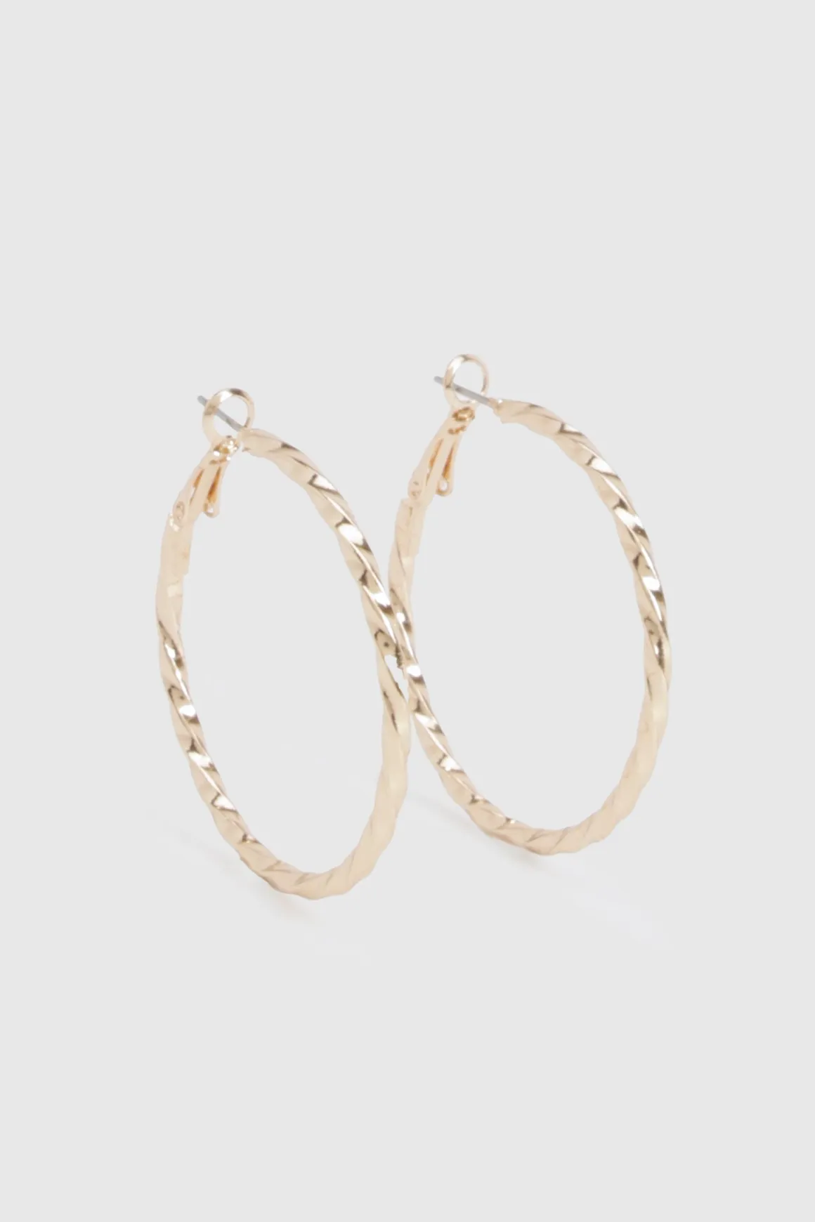 Boucles d'oreilles créoles torsadées en or