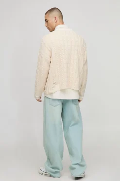 Boxy pull à col en V tricoté à câble avec ourlet effiloché