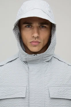 Cagoule à Casynthétiqueche Col Cheminée Carreaux Coupe Ample Oversize
