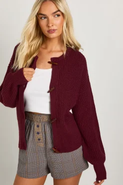 Cardigan en maille à col haut muni d'un bouton à bascule