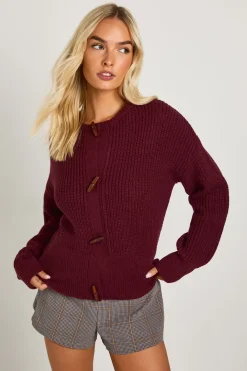 Cardigan en maille à col haut muni d'un bouton à bascule