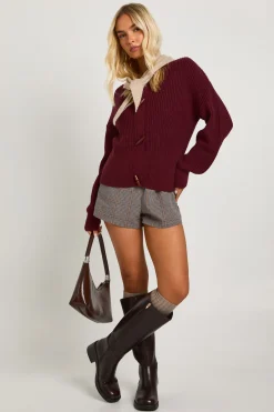 Cardigan en maille à col haut muni d'un bouton à bascule