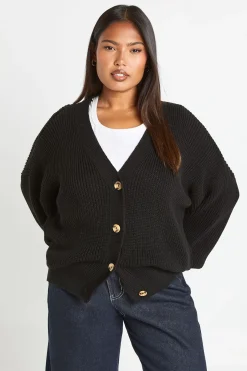 Cardigan en maille côtelée à manches ballon et bouton traversant Plus