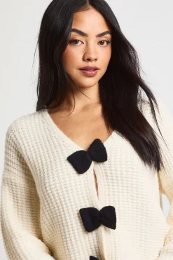 Cardigan oversize en maille épaisse avec nœud et boutons