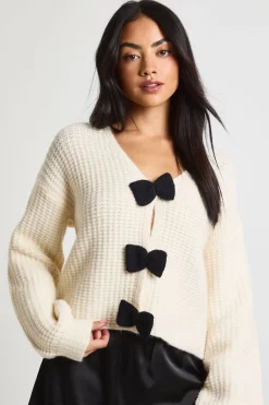 Cardigan oversize en maille épaisse avec nœud et boutons