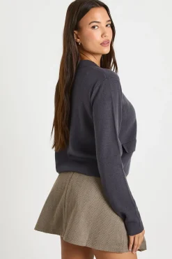 Cardigan tricoté à col boutonné double