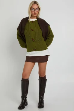 Cardigan tricot à col montant avec boutons à bascule