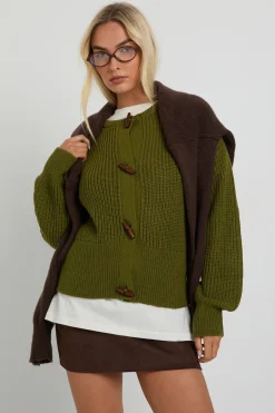 Cardigan tricot à col montant avec boutons à bascule