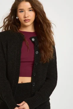 Cardigan tricoté à col rond et mini-jupe