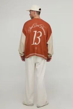 Cardigan tricoté jacquard varsity à manches côtelées surdimensionnées