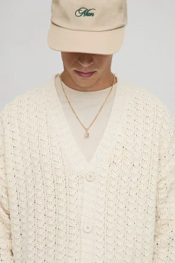 Cardigan tricoté à motif torsadé, coupe boxy décontractée