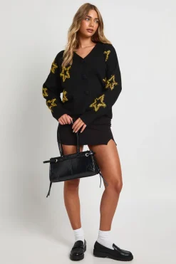 Cardigan tricoté surdimensionné à imprimé de guirlande d'étoiles