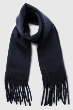 Écharpe surdimensionnée à pompons et en peluche