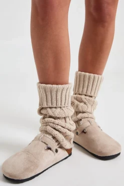 Chauffe-jambes en tricot torsadé