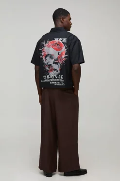 Chemise ample à coupe carrée en sergé à motif dragon