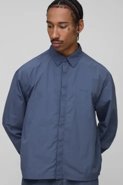 Chemise ample à patte de boutonnage dissimulée et effet froissé