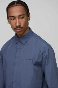 Chemise ample à patte de boutonnage dissimulée et effet froissé