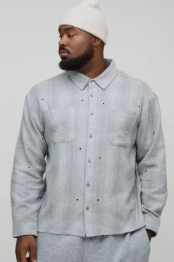 Chemise à carreaux en flanelle surdimensionnée à l'effet vieilli avec détails de quincaillerie